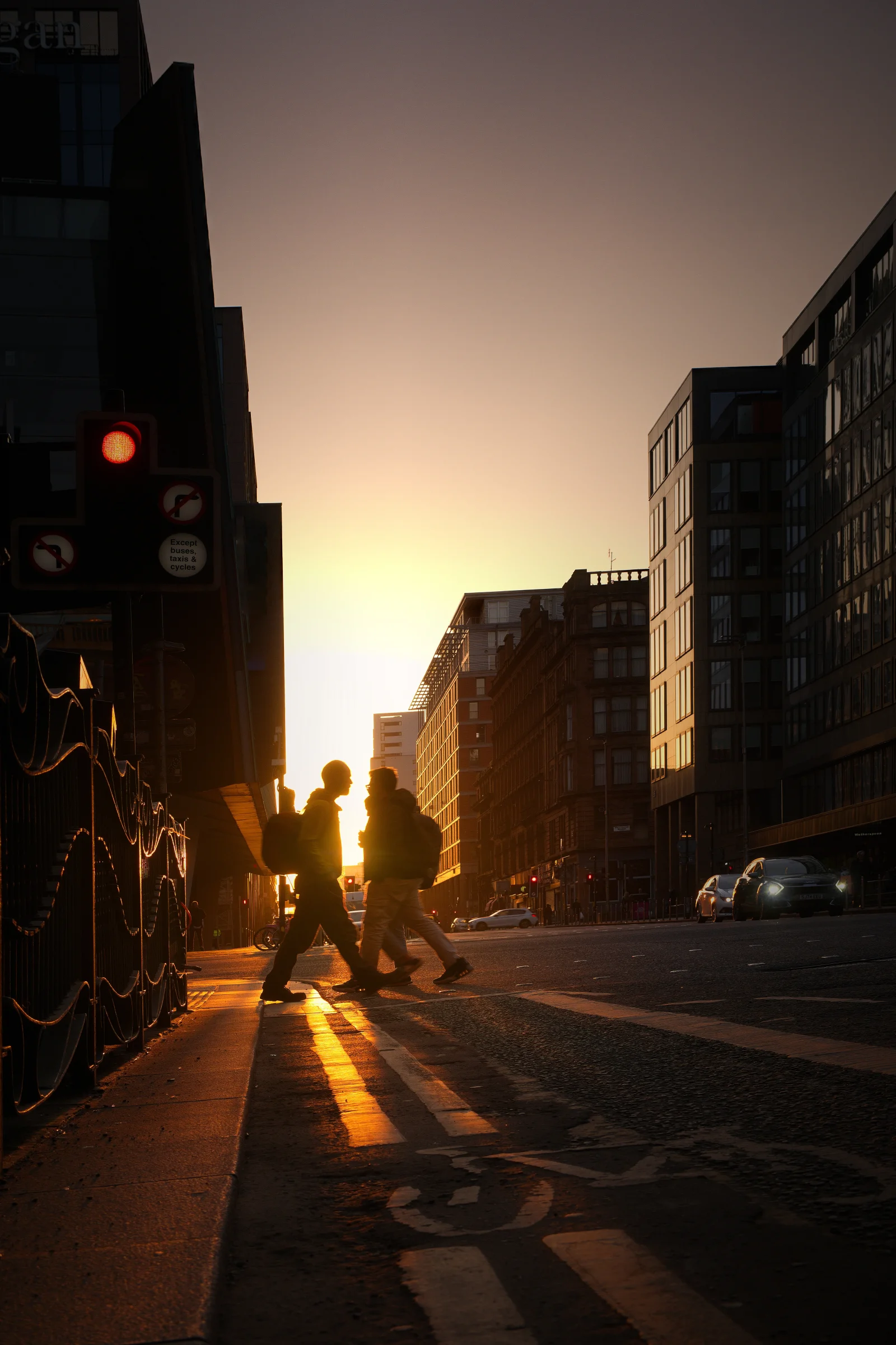 There's a strong chance this image contains the following subjects: street,  light,  travel,  city,  sunset,  dawn,  road,  scotland,  glasgow. The photographer has provided the following description: Just off Argyle Street in Glasgow and underneath the bridge of Glasgow Central Station. Epic sunrise! Photographer_name: Chris Michael. Title: Sunset in Glasgow. The photographer has provided the following description: Just off Argyle Street in Glasgow and underneath the bridge of Glasgow Central Station. Epic sunrise! Make: fujifilm. Model: X-T5. Technical: 16-80mm. Published: 2025-09-08 17:14:28