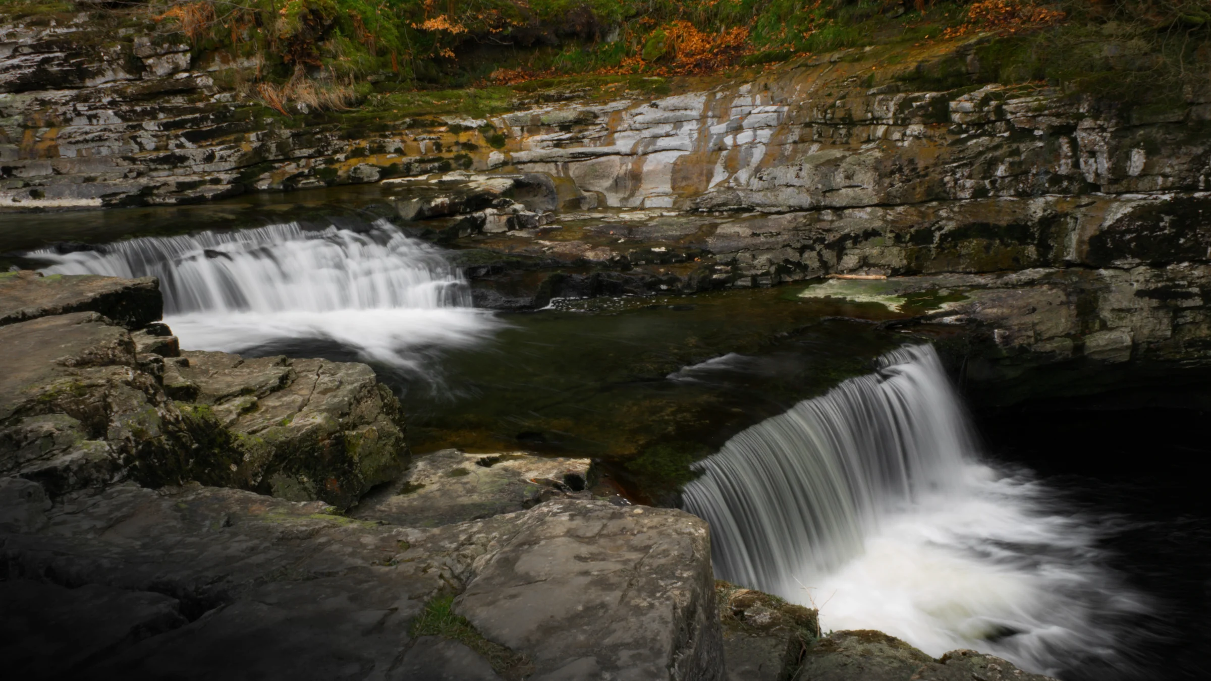 There's a strong chance this image contains the following subjects: water,  travel,  rock,  fall,  nature,  river,  waterfall,  cascade,  stream,  yorkshire. The photographer has provided the following description: A stunning waterfall (many of them in fact) in Stainforth, Yorkshire. Photographer_name: Chris Michael. Title: Stainforth Force. The photographer has provided the following description: A stunning waterfall (many of them in fact) in Stainforth, Yorkshire. Make: fujifilm. Model: X-T5 . Technical: 16-80MM. Published: 2025-09-07 23:10:12