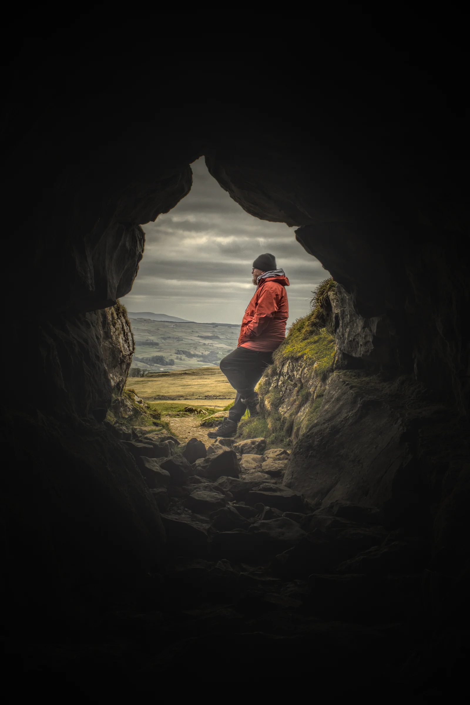 There's a strong chance this image contains the following subjects: light,  landscape,  people,  rock,  dark,  yorkshire,  yorkshiredales. The photographer has provided the following description: Just me, chilling in a cave in the winter..... like you do! Photographer_name: Chris Michael. Title: Jubilee Cave. The photographer has provided the following description: Just me, chilling in a cave in the winter..... like you do! Make: fujifilm. Model: x-t5. Technical: 16-80mm. a HDR image.. Published: 2025-09-07 23:23:23