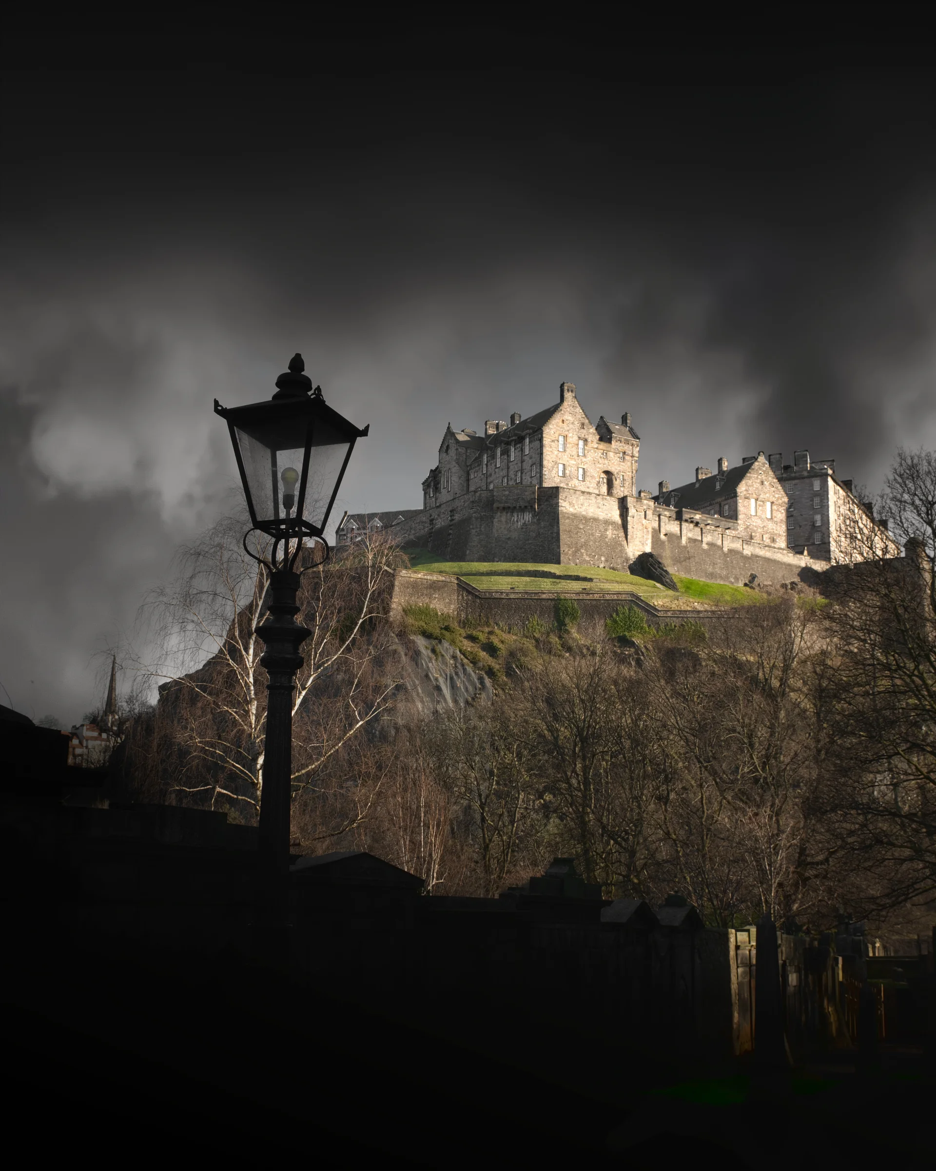 There's a strong chance this image contains the following subjects: architecture,  sky,  light,  landscape,  city,  dark,  storm,  castle,  edinburgh,  church. The photographer has provided the following description: Arrived in Edinburgh during a storm, but this didn't put me off capturing the beauty that is Edinburgh Castle underneath the cloud of doom! Photographer_name: Chris Michael. Title: Edinburgh Castle. The photographer has provided the following description: Arrived in Edinburgh during a storm, but this didn't put me off capturing the beauty that is Edinburgh Castle underneath the cloud of doom! Make: fujifilm. Model: X-T5. Technical: 16-80mm. Published: 2025-09-08 16:52:50