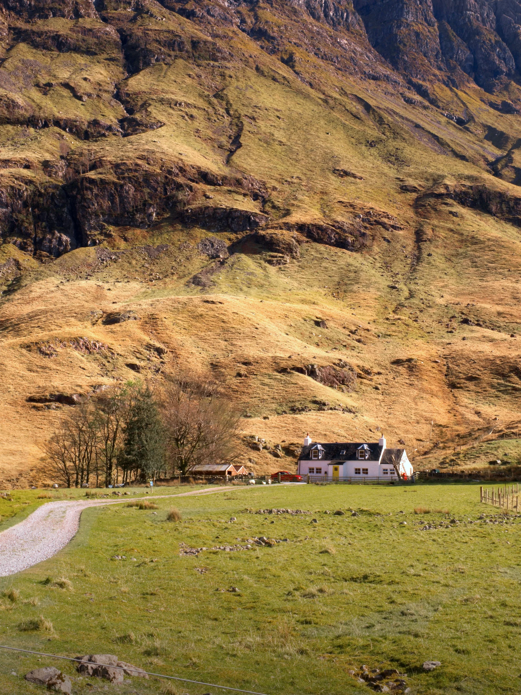 There's a strong chance this image contains the following subjects: house,  landscape,  travel,  nature,  hill,  scotland,  scottishhighlands,  glencoe,  scenic. The photographer has provided the following description: The House on the edge of Loch Achtriochtan in Glencoe. Photographer_name: Chris Michael. Title: The House. The photographer has provided the following description: The House on the edge of Loch Achtriochtan in Glencoe. Make: fujifilm. Model: X-T5. Technical: 16-80mm. Published: 2025-09-08 18:48:21