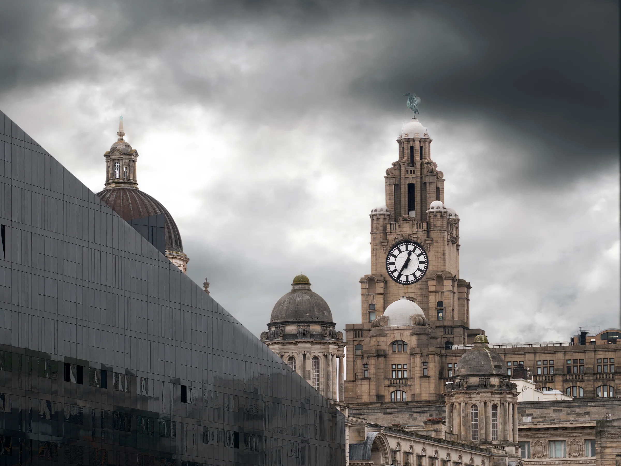 There's a strong chance this image contains the following subjects: architecture,  travel,  city. The photographer has provided the following description: The Liver Building and Cunard Building in Liverpool. Photographer_name: Chris Michael. Title: The Liver Building. The photographer has provided the following description: The Liver Building and Cunard Building in Liverpool. Make: fujifilm. Model: X-T5. Technical: 16-80mm. Published: 2025-09-10 13:41:07