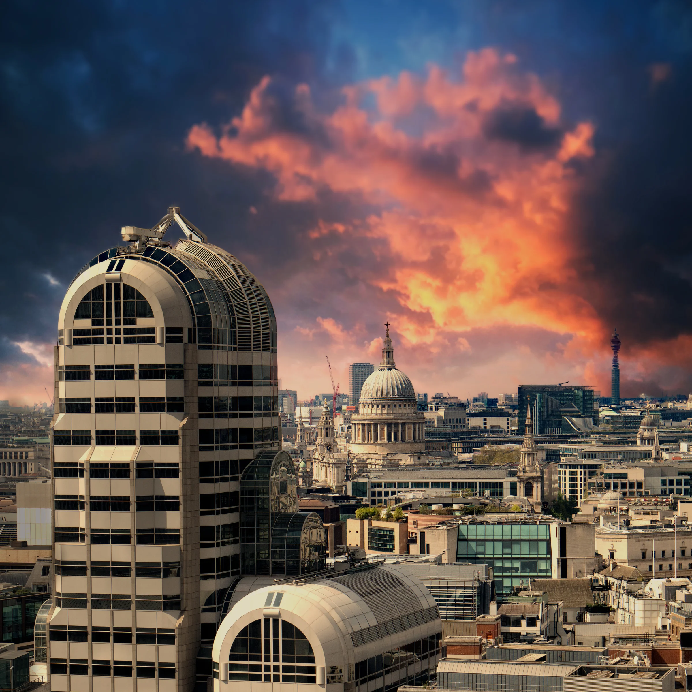 There's a strong chance this image contains the following subjects: architecture,  sky,  street,  travel,  city,  building,  london,  urban,  sunrise,  skyline. The photographer has provided the following description: Taken from the Garden at 120. The City of London landscape in the morning, with a touch of added vibrancy/warmth. Photographer_name: Chris Michael. Title: City of London. The photographer has provided the following description: Taken from the Garden at 120. The City of London landscape in the morning, with a touch of added vibrancy/warmth. Make: canon. Model: M50. Published: 2025-09-07 21:54:06