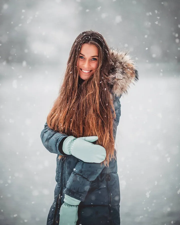 There's a strong chance this image contains the following subjects: woman,  fashion,  portrait,  model,  winter. The photographer has provided the following description: Nikon Z6, Nikkor 105mm f.1/4 FOTO has this to say about the photograph: This portrait radiates relaxed charm, blending soft lighting with crisp detail that frames the subject beautifully, the Nikkor lens doing a wonderful job with the soft blur. It feels effortlessly calm, an intimate, soothing moment caught with thoughtful poise and subtle artistry. Source: https://www.instagram.com/dennis_visuals/ Photographer_name: DES. Title: Snowwww. The photographer has provided the following description: Nikon Z6, Nikkor 105mm f.1/4 FOTO has this to say about the photograph: This portrait radiates relaxed charm, blending soft lighting with crisp detail that frames the subject beautifully, the Nikkor lens doing a wonderful job with the soft blur. It feels effortlessly calm, an intimate, soothing moment caught with thoughtful poise and subtle artistry. Published: 2025-06-25 09:11:37