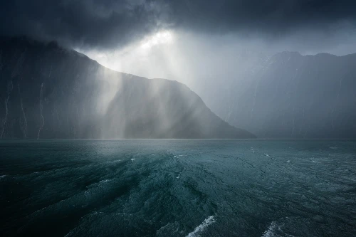 There's a strong chance this image contains the following subjects: fog,  water,  landscape. FOTO has this to say about the photograph: Stormy depth and contrast, showing great emotion within this photograph. Source: https://www.instagram.com/williampatino_photography/ Photographer_name: William Patino. Title: Low light in the Deep South. FOTO has this to say about the photograph: Stormy depth and contrast, showing great emotion within this photograph. Published: 2025-06-13 15:25:37