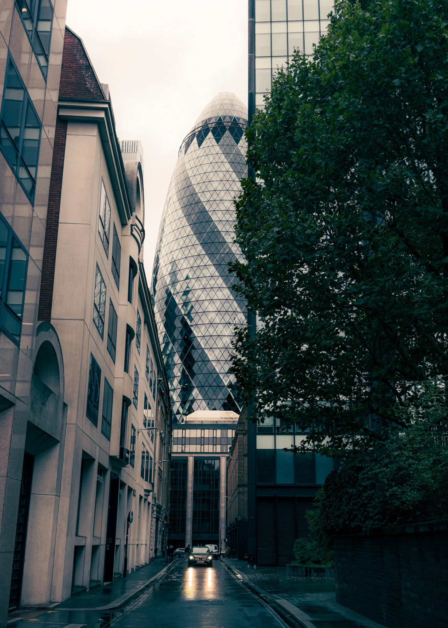 There's a strong chance this image contains the following subjects: architecture,  street,  city,  building,  london,  urban. Photographer_name: Lee Sillery. Title: Moody London. Make: iphone. Model: 15 Pro Max. Technical: 1/169 f1.8, 80 ISO. Published: 2025-09-14 22:59:44